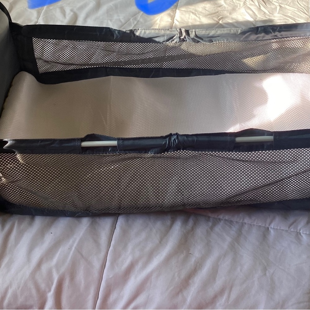 Diaper bag with fold out changing table.